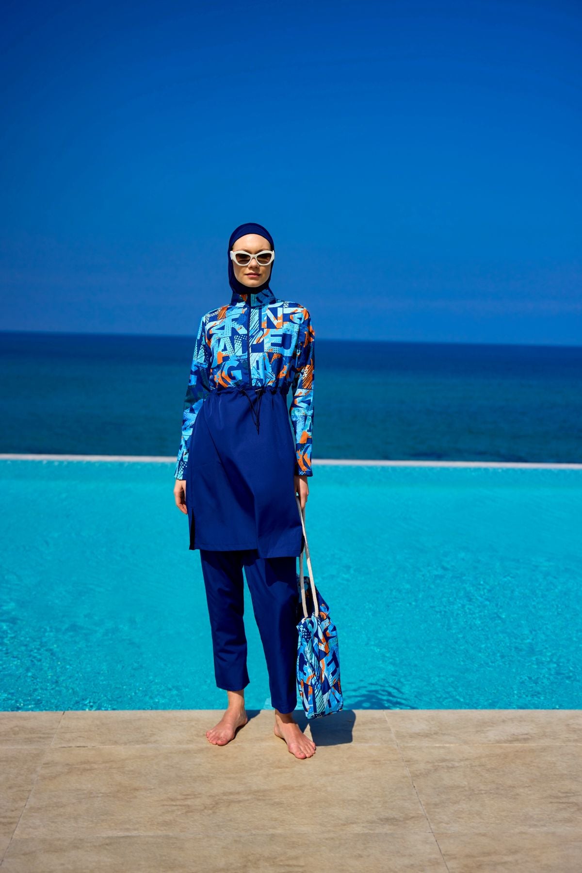 Riva Mera by Marina │Burkini Modest Swimwear Set 4-Teilig marineblau mit blau-oranger Aufschrift - R2503